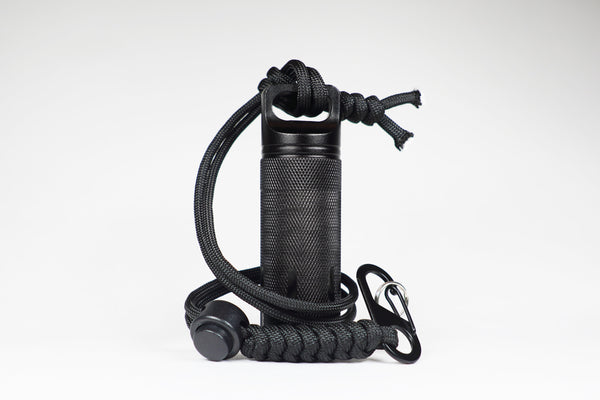 EDC Canister clipped to the paracord lanyard