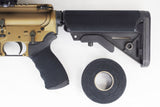 TinGrip Black cloth grip tape roll next to a tool handle wrapped for grip