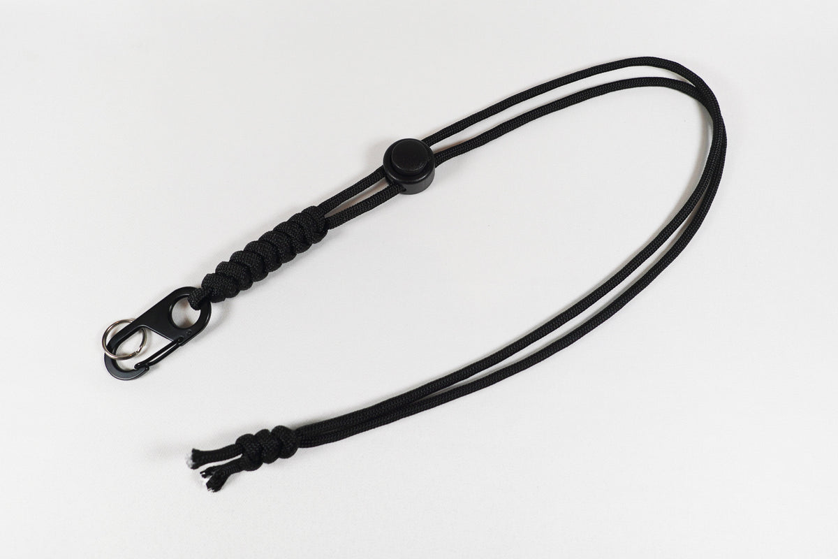Black 550 paracord neck lanyard with adjustable button and dual-gate clip
